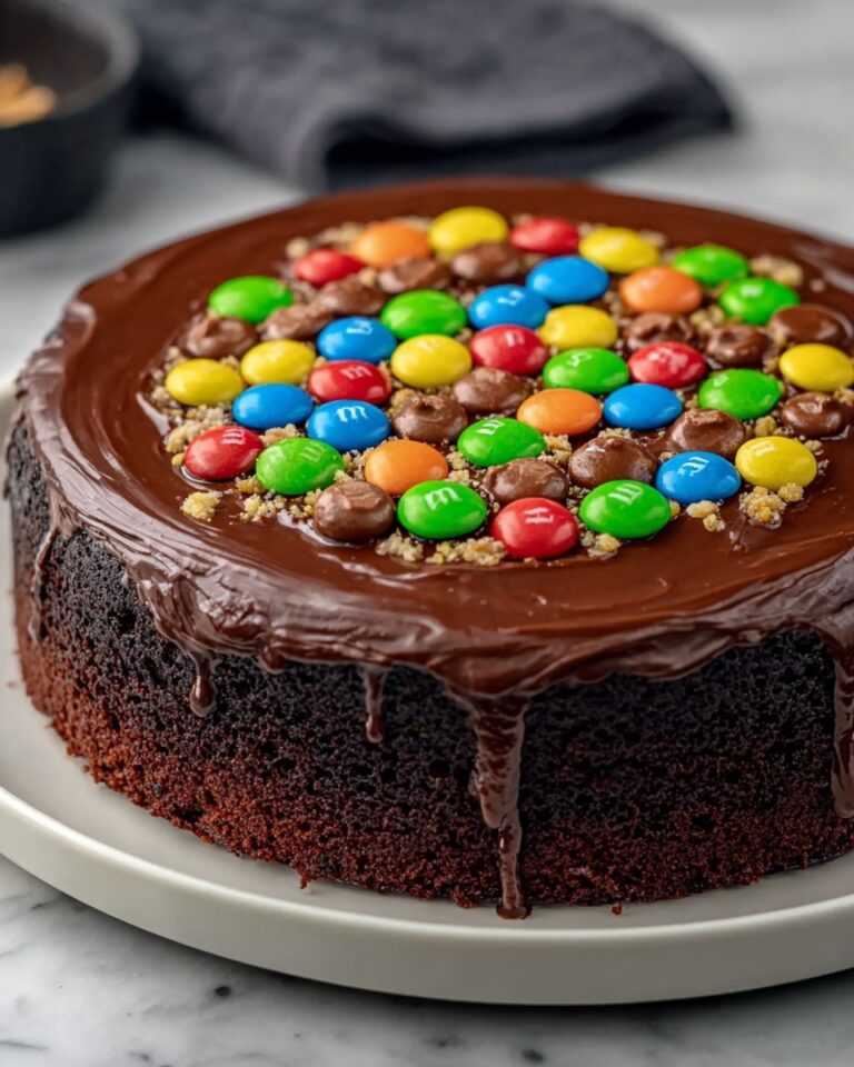Candy-filled M&M Drip Cake Recipe