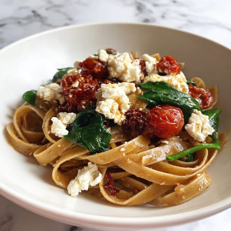 Creamy Garlic Tomato Chicken and Spinach Fettuccine Recipe