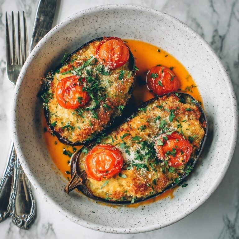 Savory Stuffed Eggplant with Ground Beef, Rice, and Mediterranean Spices Recipe