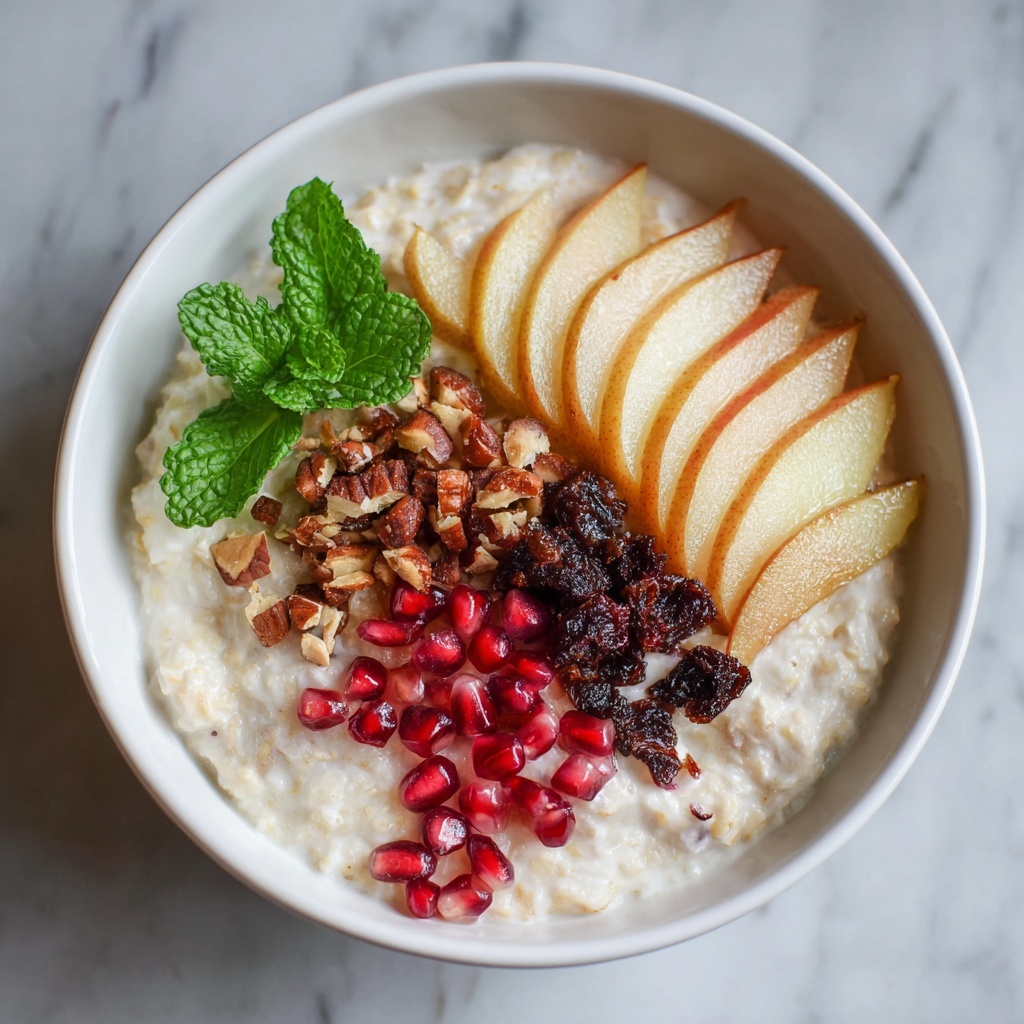 Steel Cut Oats with Maple Roasted Pears, Pomegranate Seeds, and Nuts Recipe - Recipe Image