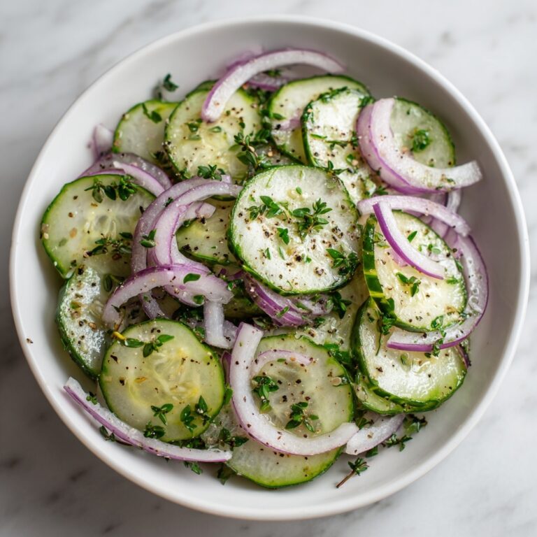 Tangy Cucumber Onion Salad: Your Refreshing Summer Sidekick Recipe